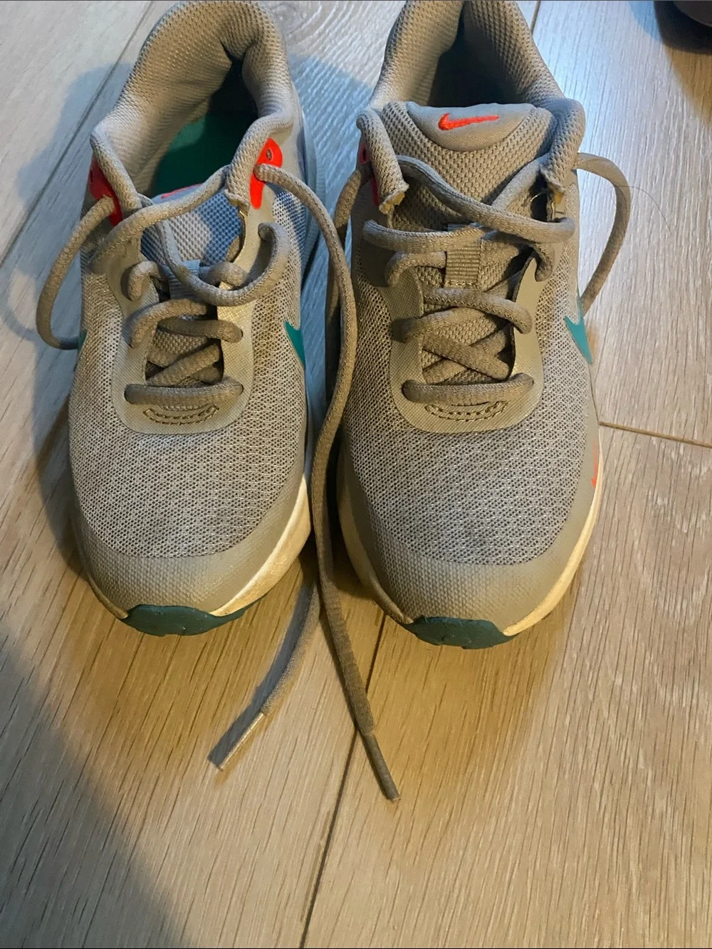 Nike Kids Gray Sneakers with Teal and Coral Accents